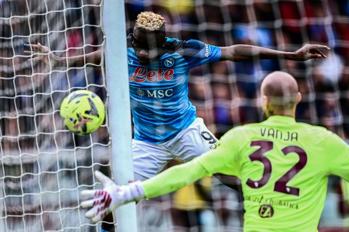 Victor Osimhen (L) scored two headers as Napoli continued their march towards the title