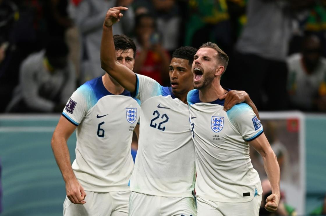 England's Jordan Henderson celebrates with Jude Bellingham after scoring against Senegal