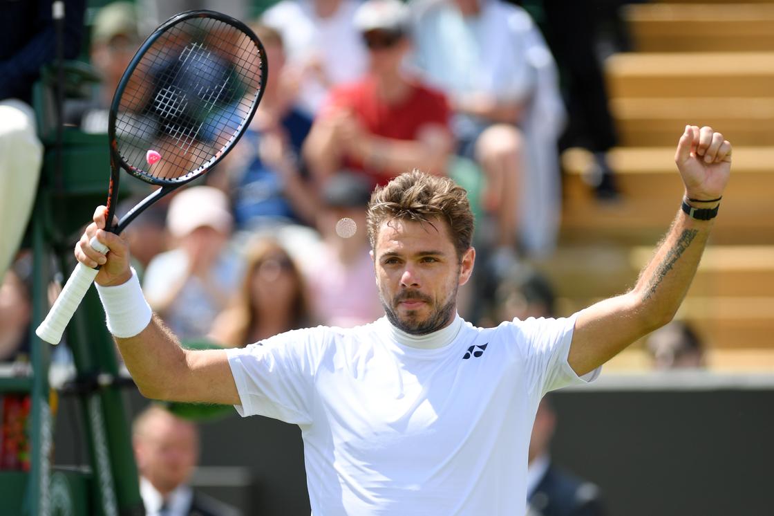 Stan Wawrinka celebrates match point in his Men's Tennis Singles first-round match against Ruben Bemelmans during Day one of The Championships. Frequent injuries have curtailed his potential to be the best tennis player of all time