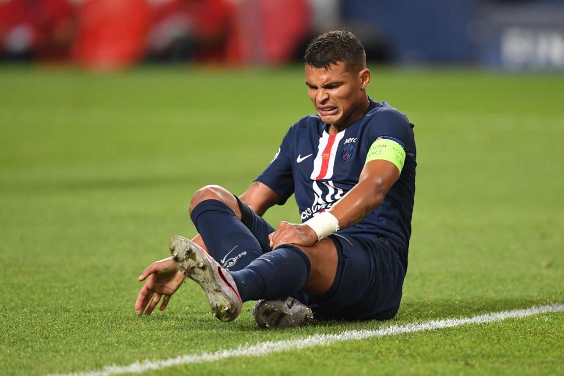 Thiago Silva reacts after being injured in a match against Bayern Munich