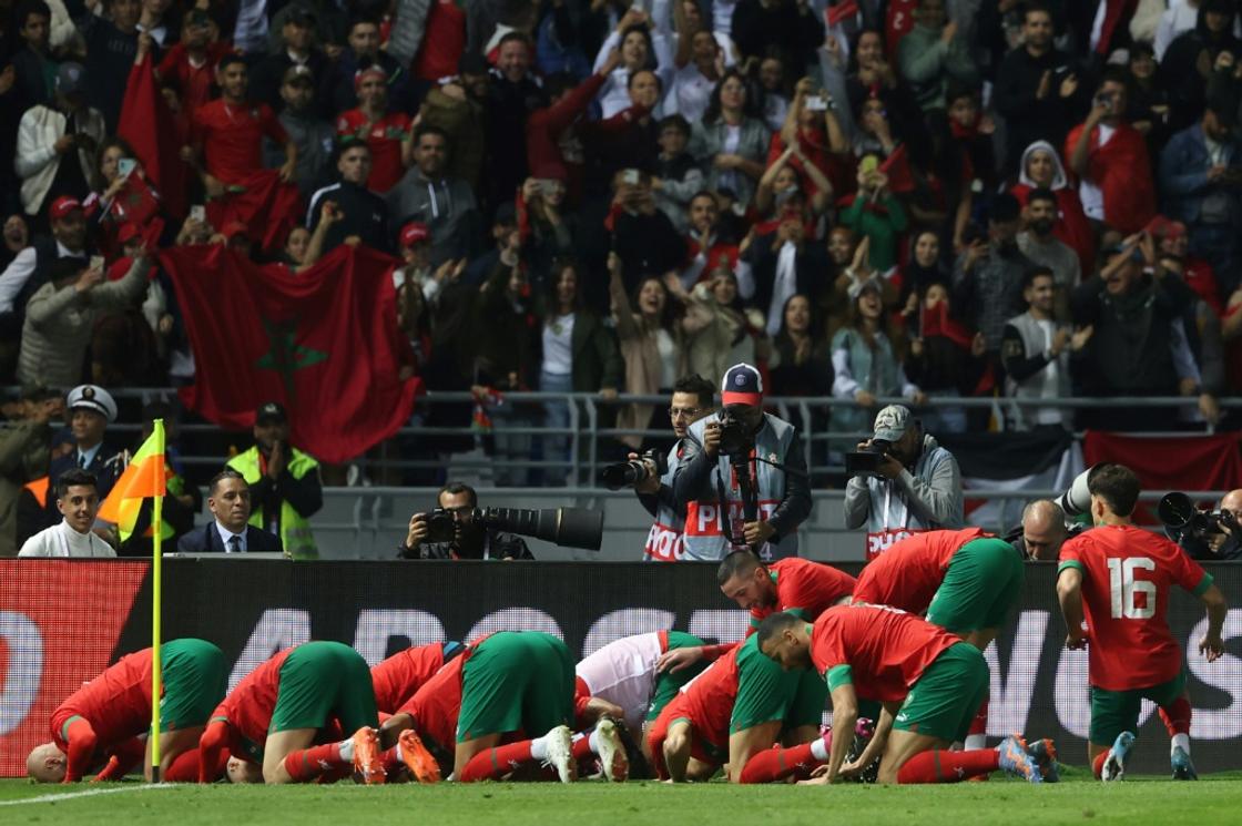 Celebration: Morocco's players after  their second goal