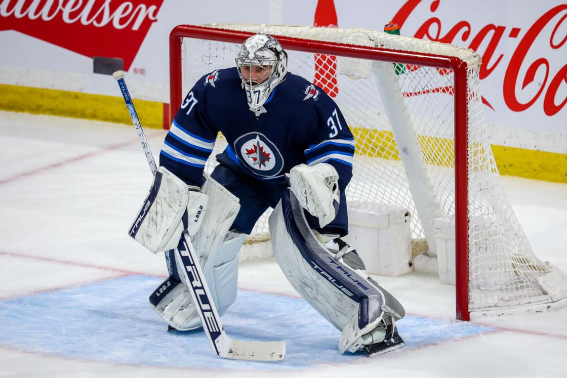 Connor Hellebuyck's trade