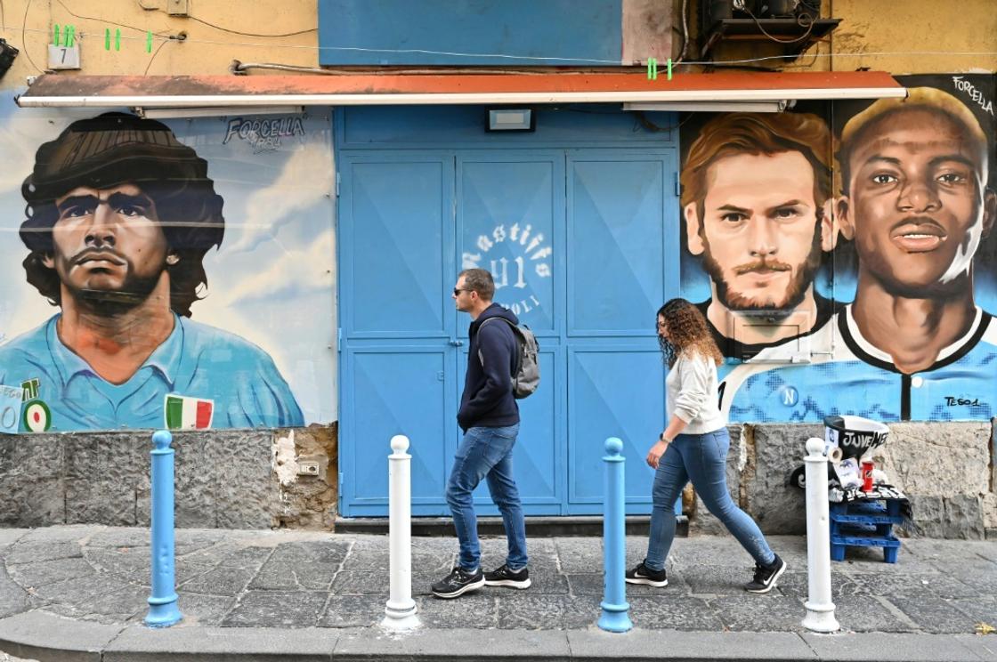Khvicha Kvaratskhelia and Victor Osimhen appear alongside icon Diego Maradona all over Naples
