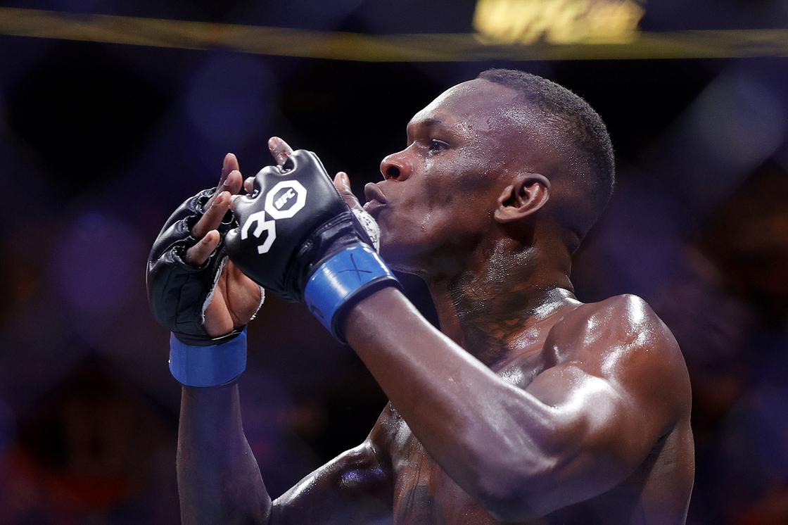 Israel Adesanya Hangs Out With Kamaru Usman Adekunle Gold After Beating Pereira 