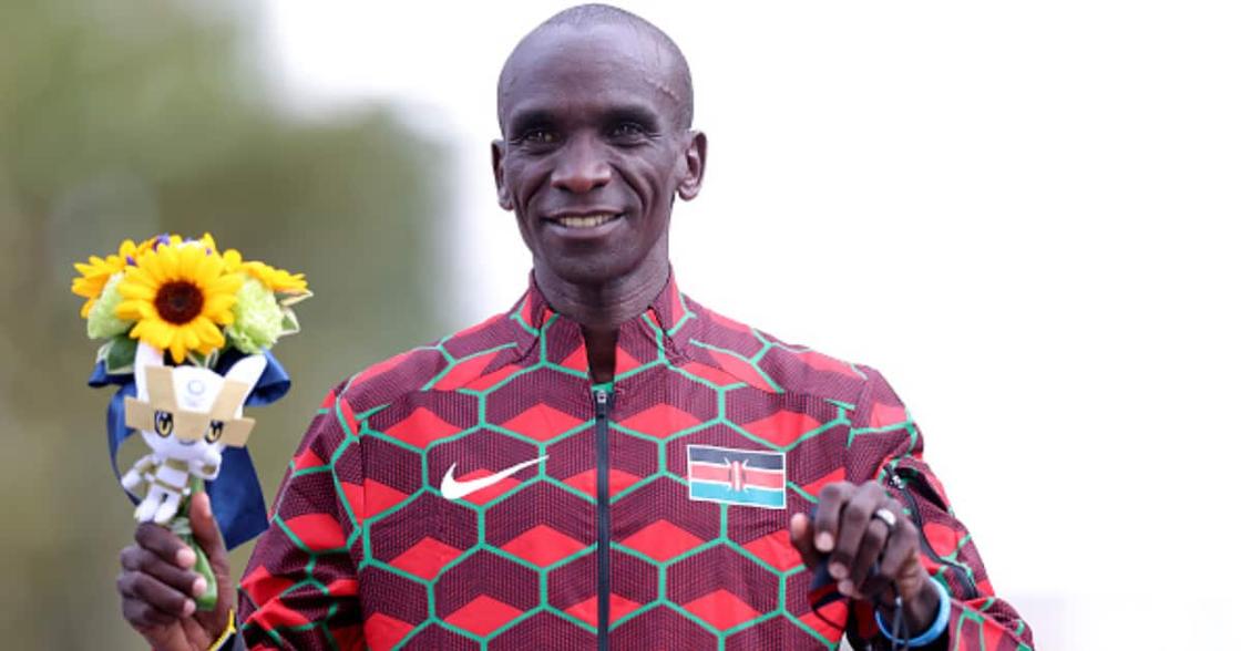 Gold medalist, Eliud Kipchoge of Team Kenya poses during the flower ceremony for the Men's Marathon Final on day sixteen of the Tokyo 2020 Olympic Games at Sapporo Odori Park on August 08, 2021 in Sapporo, Japan. (Photo by Lintao Zhang/Getty Images)