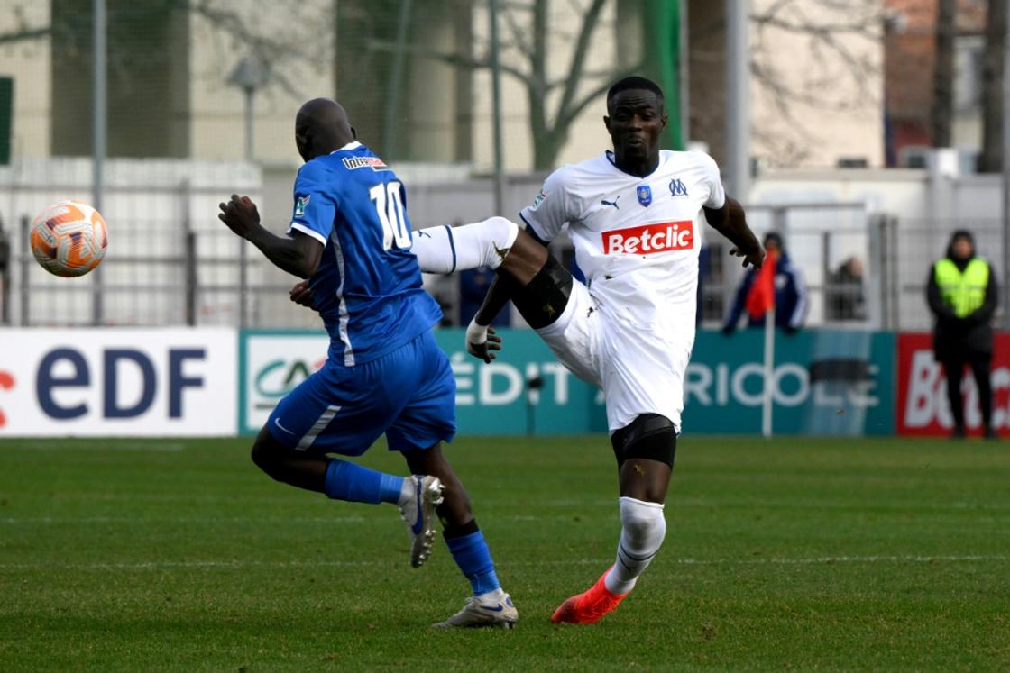 Foul play: Marseille's Ivorian defender Eric Bailly fouls Hyeres midfielder Almike Moussa N'Diaye and is red-carded