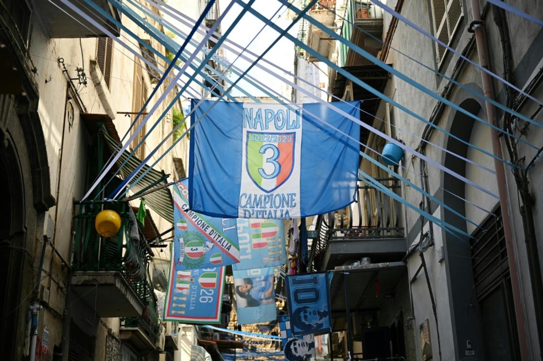 Naples' Spanish quarter is bedecked in flags and banners celebrating a first Serie A title since 1990