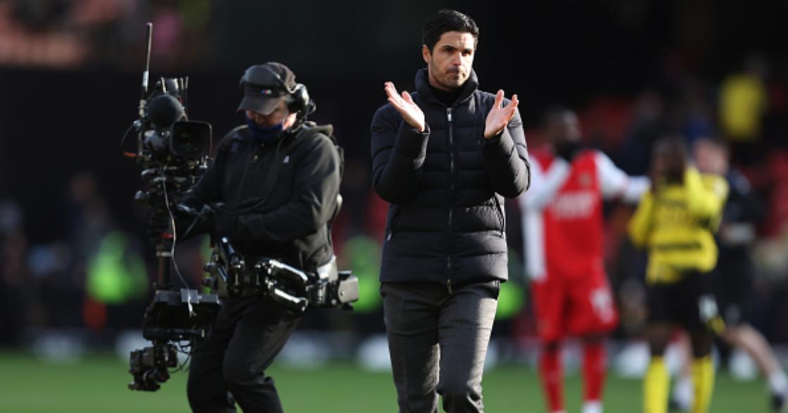 Mikel Arteta, Manager of Arsenal applauds fans following their sides victory after the Premier League match between Watford and Arsenal at Vicarage Road on March 06, 2022 in Watford, England. (Photo by Julian Finney/Getty Images)