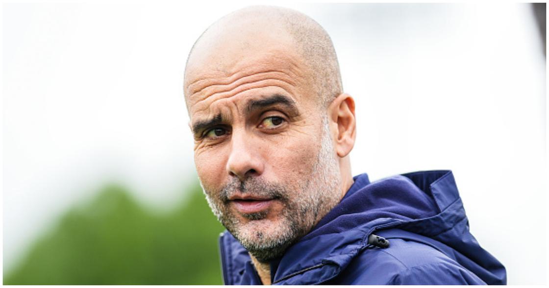 Manchester City's Pep Guardiola looks on during training at Manchester City Football Academy. Photo by Tom Flathers.