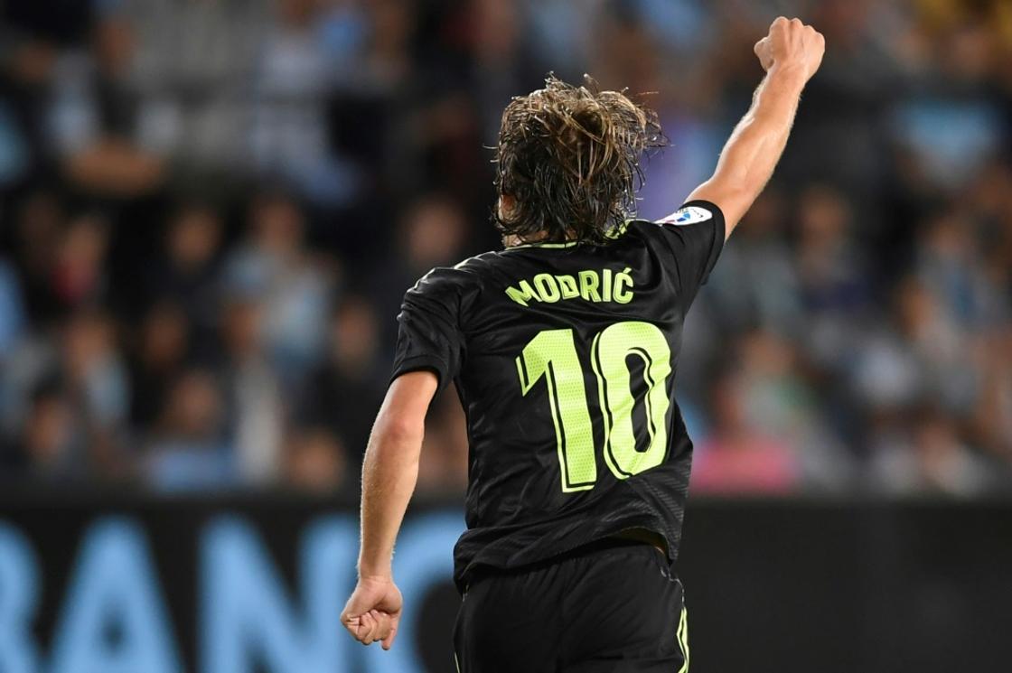 Luka Modric celebrates after scoring Real Madrid's second goal in their 4-1 win at Celta Vigo on Saturday