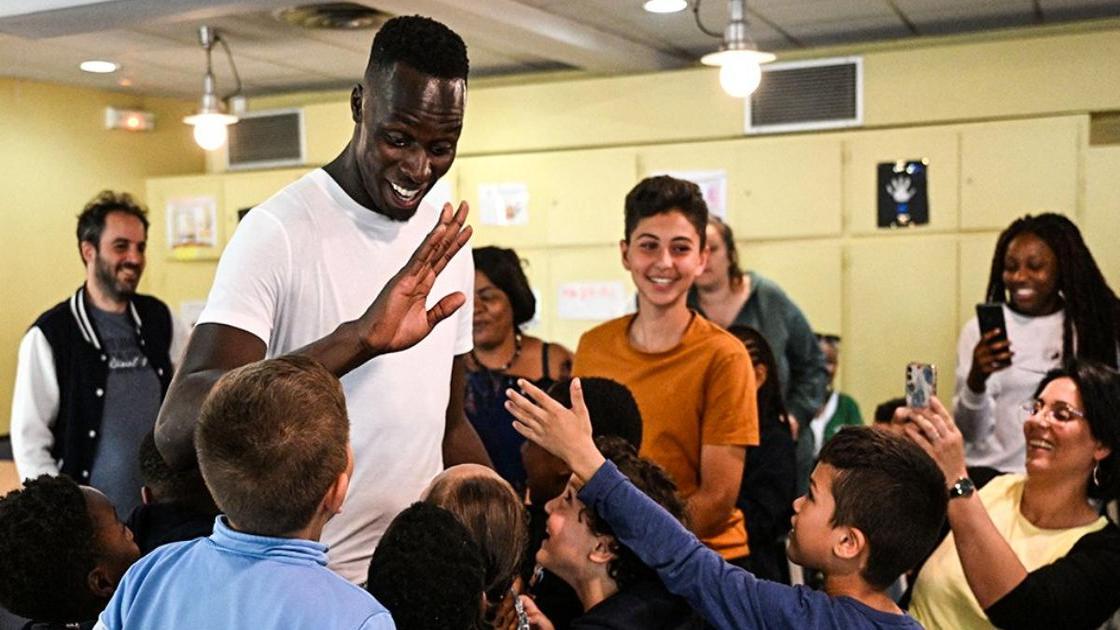 Chelsea goalkeeper Edouard Mendy spends time with school children in Paris after supporting French start-up