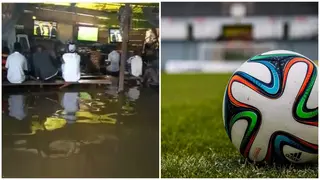 Desperate Bayelsa Fans Storm Football Viewing Centre, Enjoy EPL Football Match Despite Flood