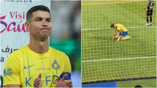 Cristiano Ronaldo endures 'Messi' chants while on his knees during Saudi game