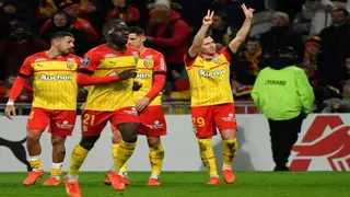 Lens edge Auxerre to stay on heels of PSG