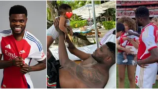 Arsenal Midfielder Thomas Partey Performs Daddy Duties on Vacation With Newly Born Daughter