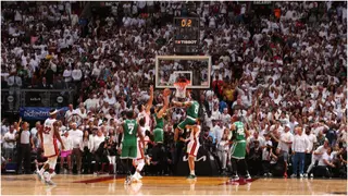 Celtics' Derrick White reacts after sinking last second game-winner to force Game 7