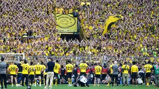 Emotional scenes as Dortmund fans show love to players despite Bundesliga title loss