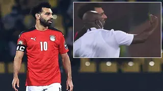 Salah takes selfie with a member of Super Eagles coaching staff after Egypt's 1-0 loss