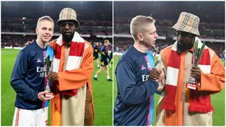 Nigerian music star Patoranking presents Arsenal Player of the Month award to Zinchenko