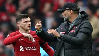Liverpool's Robertson elbowed by assistant referee