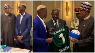 Drama as President Buhari asks stunning question as Eagles star Omeruo presents him jersey, ball in Spain