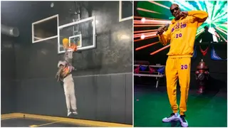 Watch Snoop Dogg throw down incredible one-handed dunk at 51