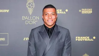 Kylian Mbappe appears to sign fan's dress shirt before Ballon d'Or ceremony in France