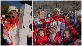 Jubilation in China As Legendary Actor Jackie Chan Carries Olympic Torch Atop Great Wall