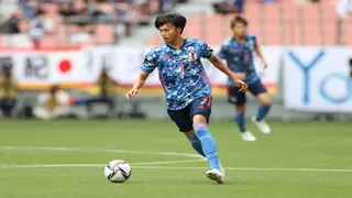 Who is Kaoru Mitoma, the Japanese footballer who studied football at the university?