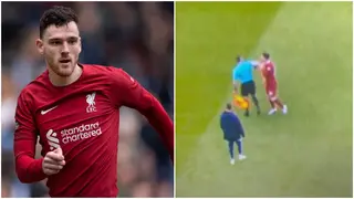 Watch bizarre moment as linesman appears to elbow Andy Robertson vs Arsenal