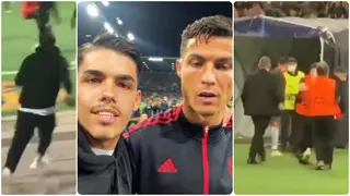 Moment Cristiano Ronaldo Fan Escape From Stewards to Steal Selfie With the Man United Star