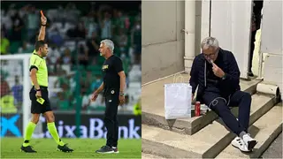 Mourinho Sits On The Floor To Eat Takeaway Food Outside Stadium After Referee Issued Him Red Card