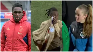 Super Eagles star Bassey takes off his shirt, gives female fan on the pitch as video breaks internet