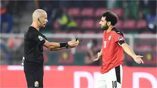Bizarre scenes in AFCON final as angry referee hands cards, whistle to Egyptian star in response to complaints