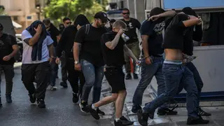 Thirty-five more people charged after fatal stabbing of Greek football fan