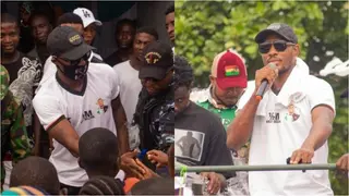 Super Eagles star Odion Ighalo spotted in street carnival in Ajegunle, shares gifts to youths and widows