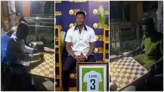Video: Heartwarming Moment Asamoah Gyan Engages Father in Draughts Game