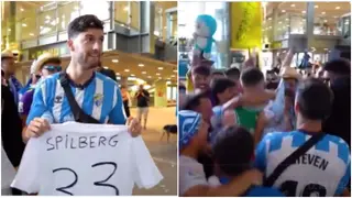 Frustrated Malaga fans mob random man at the airport as 'new signing'