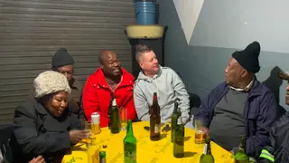 Moroka Swallows Coach Dylan Kerr Spotted in a Shebeen With Supporters to Celebrate Escaping PSL Relegation