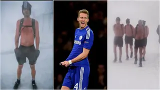 Ex Chelsea star Andre Schurrle spotted trekking shirtless up freezing mountains