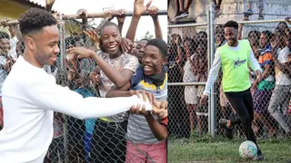 Heartwarming moment Manchester City star visits Jamaica, plays football with the youth