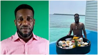 Super Eagles Legend Jay Jay Okocha Flaunts Meal Tray on Water As He Enjoys Lavish Holiday