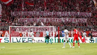 Bayern Munich supporters disagree with UEFA's fixture rescheduling decision following Queen Elizabeth's death