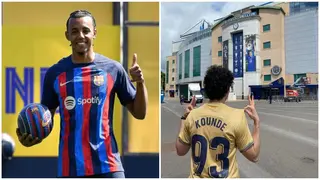 Barcelona fan trolls Chelsea in England, poses with Jules Kounde jersey outside Stamford Bridge