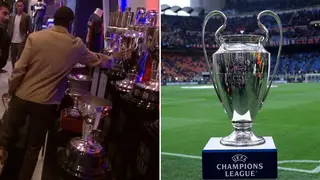 Man on a mission: Dembele makes clear his ambition as he is spotted touching the UCL trophy