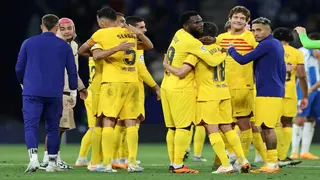 Barcelona earn La Liga title with Espanyol rout