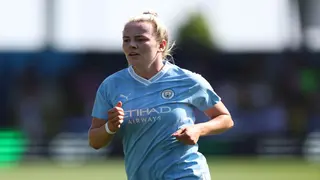 How much is Lauren Hemp's salary, where is she from and who does she play for?