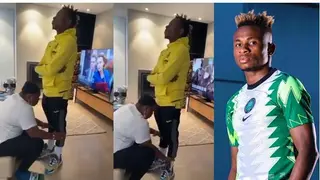 Mother of top Super Eagles star holds son's legs, prays for him before traveling to Cameroon for AFCON