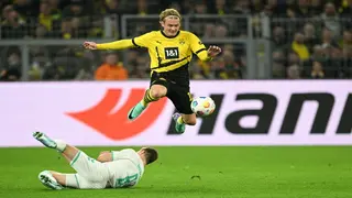 Brandt sinks Bremen to send Dortmund top