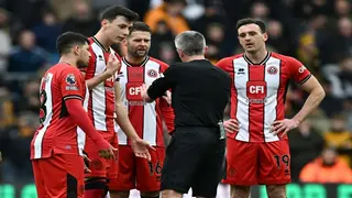 Sheffield United players square off in defeat at Wolves